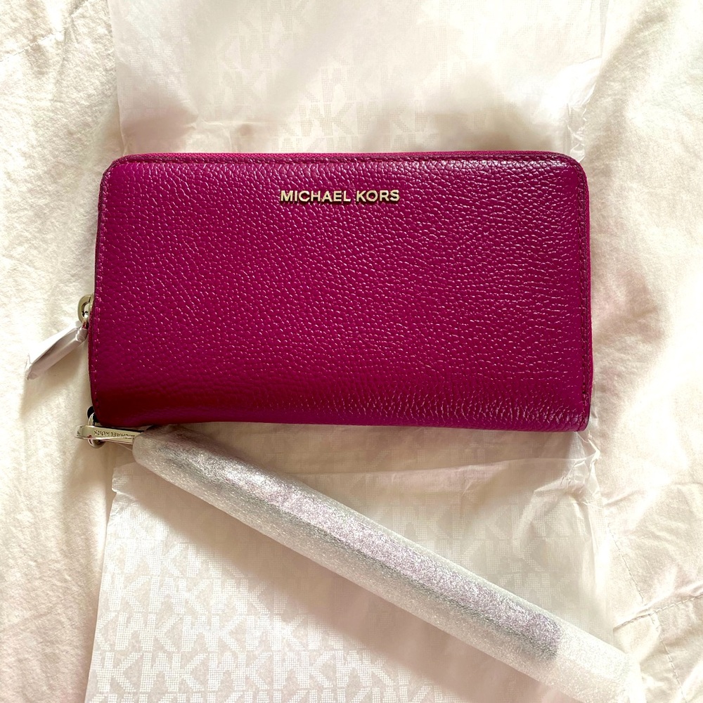 NWT! Michael Kors large leather, smart phone wristlet - color garnet